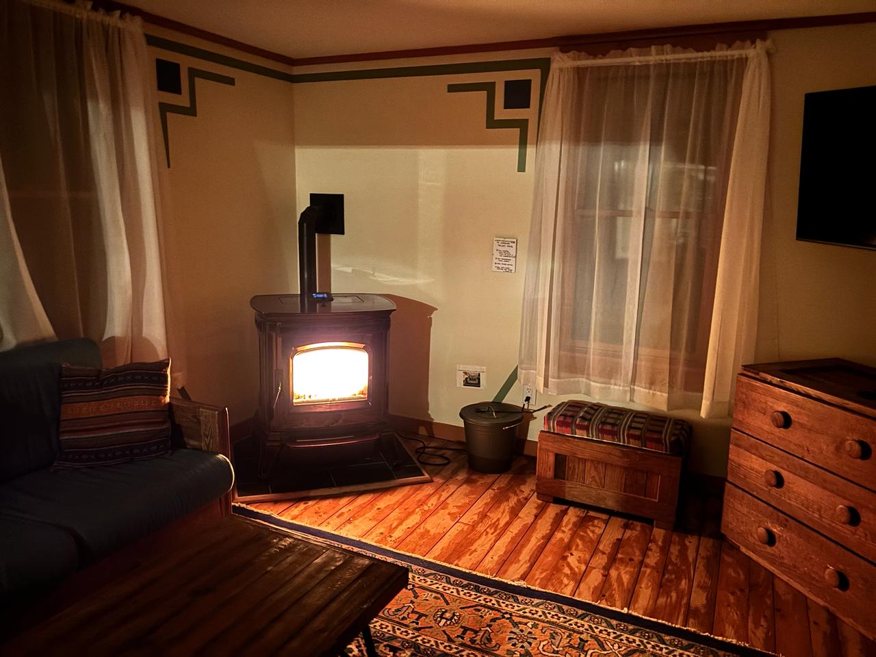 Wood stove glowing at night